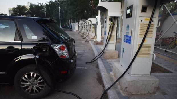 A BYD electric car at a charging station in Beijing on September 11, 2017. Photo: Agence France-Presse