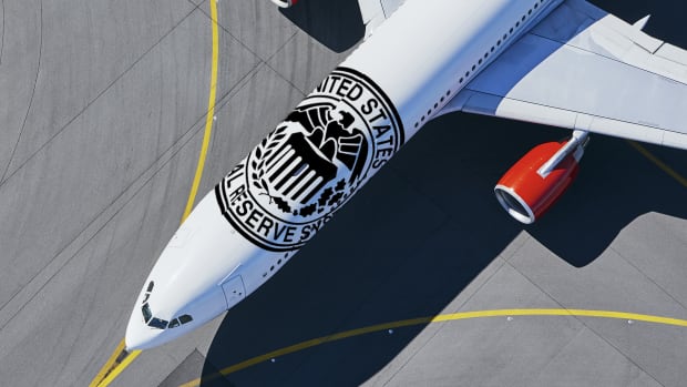 Photo illustration shows airplane with Federal Reserve seal.