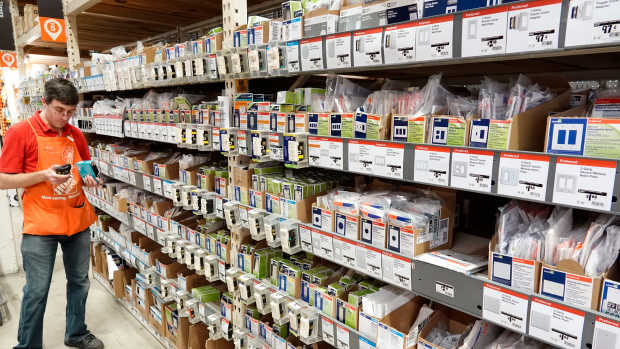 Miami, The Home Depot, Employee in electrical switch aisle. (Photo by: Jeffrey Greenberg/Education Images/Universal Images Group via Getty Images)