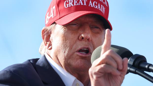 VANDALIA, OHIO - MARCH 16: Republican presidential candidate former President Donald Trump  speaks to supporters during a rally at the Dayton International Airport on March 16, 2024 in Vandalia, Ohio.  The rally was hosted by the Buckeye Values PAC. (Photo by Scott Olson/Getty Images)