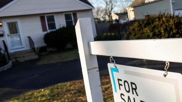 West Islip, New York: A for sale sign in front of a home in West Islip, New York on December 13, 2023. (Photo by Steve Pfost/Newsday RM via Getty Images)