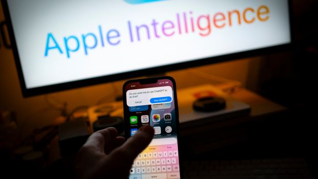 The Apple Intelligence prompts a user to ask for permission to use ChatGPT in this illustration photo taken on 13 June, 2024 in Warsaw, Poland. (Photo by Jaap Arriens/NurPhoto via Getty Images)