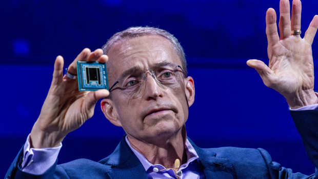 Pat Gelsinger, chief executive of Intel, holds an artificial intelligence processor as he speaks during the Computex conference in Taipei on Tuesday, June 4, 2024.