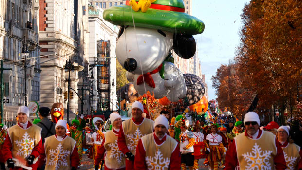 NEW YORK, NY - NOVEMBER 23: The Beagle Scout Snoopy balloon floats down Central Park West during the Macy's Thanksgiving Day Parade on November 23, 2023, in New York City.  (Photo by Gary Hershorn/Getty Images)