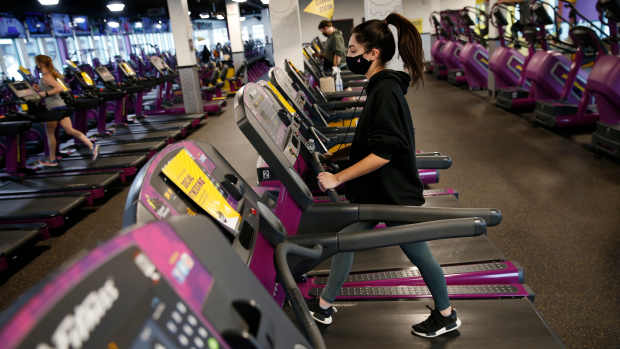 BOSTON - FEBRUARY 1: A person works out at Planet Fitness as they re-open at 25 percent capacity  in Boston's Dorchester on Feb. 1, 2021. (Photo by Jessica Rinaldi/The Boston Globe via Getty Images)