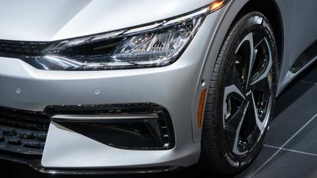 A headlight of the Kia EV6 compact sports utility vehicle (SUV) during the 2022 New York International Auto Show (NYIAS) in New York, U.S., on April 14, 2022. Photographer: Jeenah Moon/Bloomberg via Getty Images