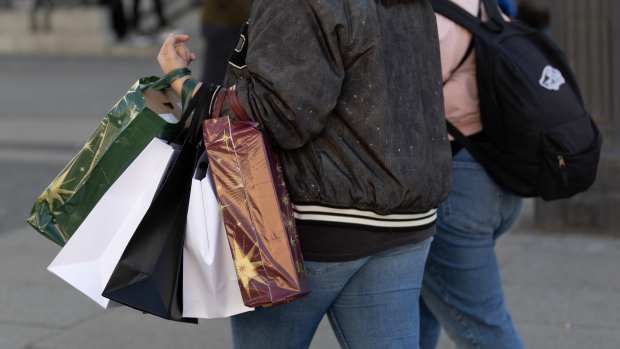 MADRID, SPAIN - NOVEMBER 24: A person carries several shopping bags during Black Friday, on 24 November, 2023 in Madrid, Spain. This year, the forecast for Spanish spending on Black Friday is 6% higher than last year's spending. In addition to discounts in stores, on the occasion of this day the Madrid City Council has put free buses in the city to encourage shoppers to travel by public transport. Yesterday, the day before the Black Friday sales campaign, Bizum and ATMs throughout Spain gave failures due to a fall of the Redsys payment system, the virtual payment platform that acts as an intermediary. This is the second time this has happened, since last Saturday, November 18, Bizum suffered its first crash. (Photo By Eduardo Parra/Europa Press via Getty Images)