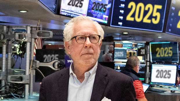 Doug Kass Standing in the New York Stock Exchange Discussing Investing and Stocks