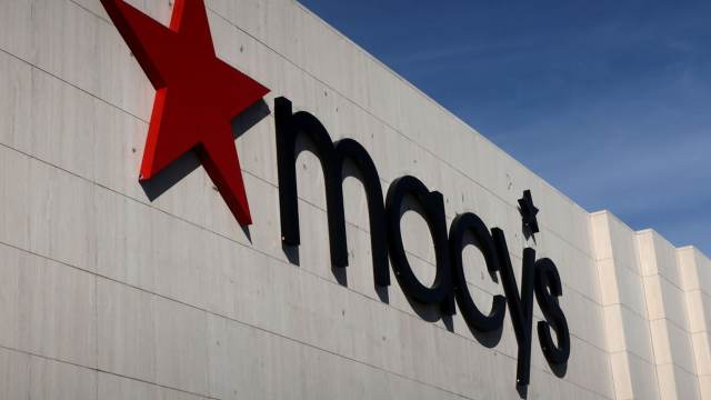 PARAMUS, NJ - A Macy's corporate logo hangs on the wall of their store at the Garden State Plaza Mall in Paramus, New Jersey