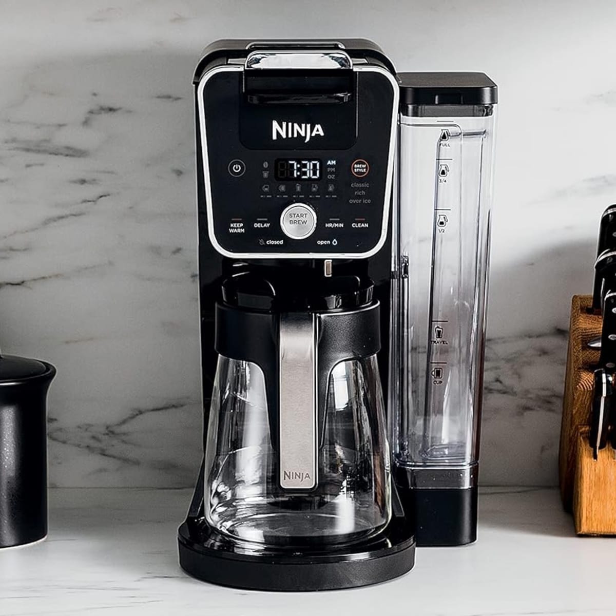 https://www.thestreet.com/.image/ar_1:1%2Cc_fill%2Ccs_srgb%2Cfl_progressive%2Cq_auto:good%2Cw_1200/MjAxMTUzNzE5NTY2MzQ2MDEw/ninja-dualbrew-coffee-maker-on-counter.jpg