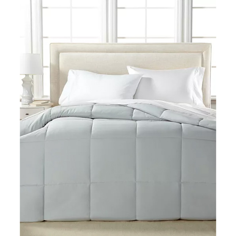 Macy's is selling a top-rated 'lighter than air' $130 down-alternative comforter for just $20