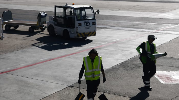 Airport Service Workers Campaign For Better Conditions - TheStreet