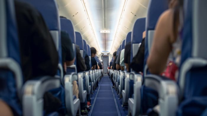 The weirdest reason airline passengers choose the middle seat - TheStreet