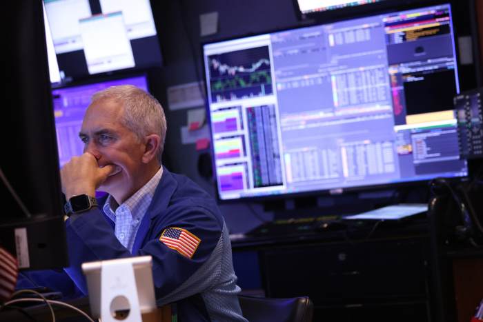 NEW YORK, NEW YORK - APRIL 09: Traders work on the floor of the New York Stock Exchange during afternoon trading on April 09, 2024 in New York City.  The stock market closed mixed as Wall Street awaited the release of the latest inflation data.  (Photo by Michael M. Santiago/Getty Images)