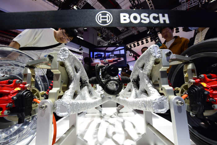 Visitors visit the booth of Bosch Group at the 2023 Shanghai Auto Show in Shanghai, China, April 21, 2023.