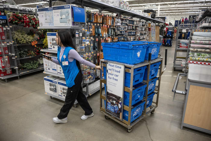 Here S How Much Walmart Employees Get Paid In 2024 TheStreet   Shoppers At A Walmart On Black Friday 