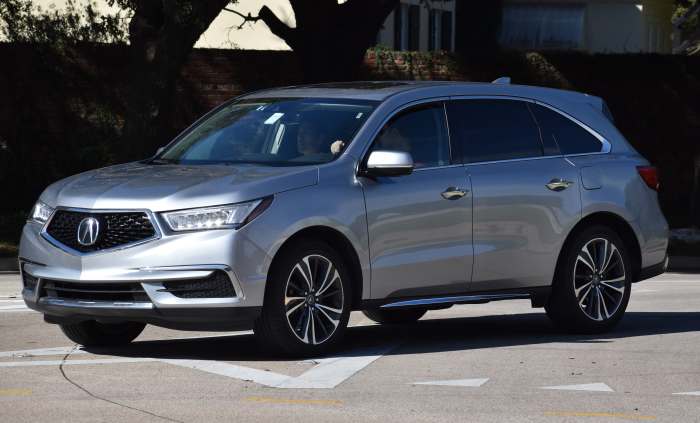 The Acura MDX, a midsize luxury SUV, is a popular choice for families due to its three rows of seating.