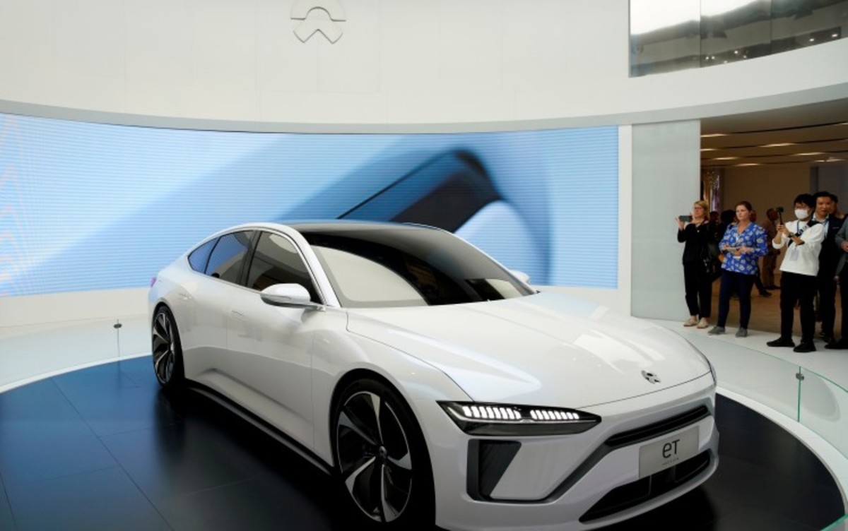 Tesla deals merger nio