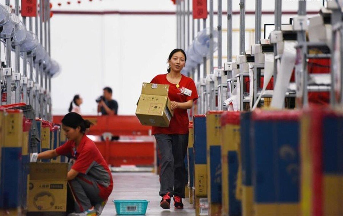 Jdcoms Logistics Employees Are Seen At Work Inside A Company Warehouse In Guan A Country In Northern Chinas Hebei Province As Part Of Preparations For The 618 Midyear Shopping Festival In June 2016 Ph 