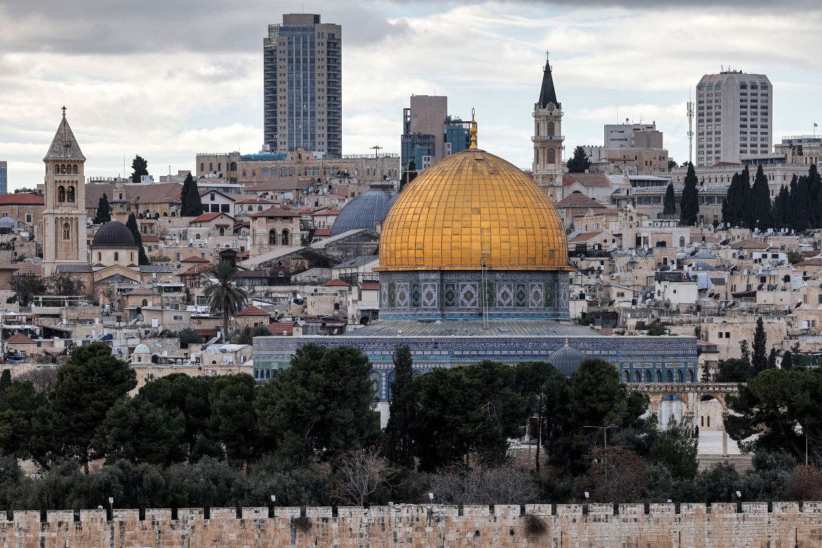 This view from the Mount of the Olives shows the old city walls of Jerusalem, the Dome of the Rock mosque in the Aqsa complex, the Church of the Holy Sepulchre, and the Catholic Franciscan monastery of St Saviour, on December 28, 2024. (Photo by AHMAD GHARABLI / AFP) (Photo by AHMAD GHARABLI/AFP via Getty Images)