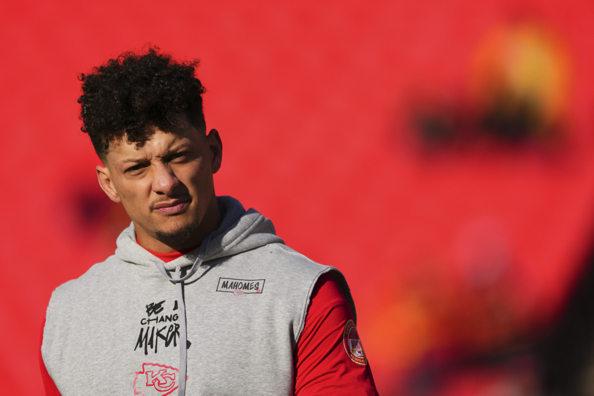 KANSAS CITY, MO - DECEMBER 21: Patrick Mahomes #15 of the Kansas City Chiefs warms up before kickoff against the Houston Texans during an NFL football game at GEHA Field at Arrowhead Stadium on December 21, 2024 in Kansas City, Missouri. (Photo by Cooper Neill/Getty Images)